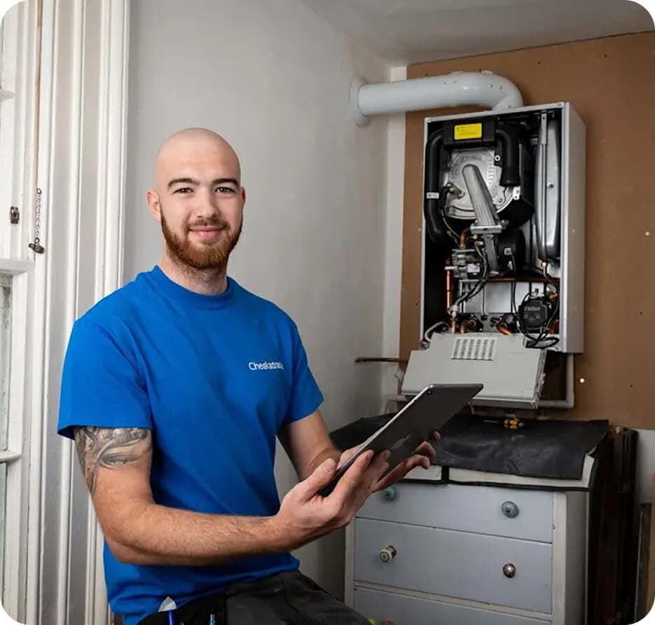 Engineer servicing a boiler